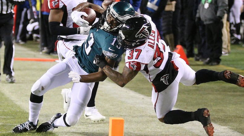 Falcons safety Ricardo Allen stops Eagles wide receiver Nelson Agholor just short of the end zone Jan. 13, 2018, in Philadelphia. Curtis Compton/ccompton@ajc.com