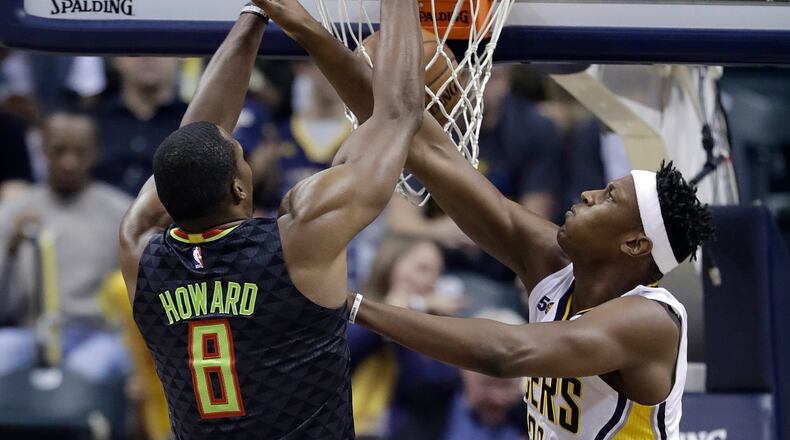 Atlanta Hawks’ Dwight Howard (8) dunks against Indiana Pacers’ Myles Turner during the first half of an NBA basketball game Wednesday, Nov. 23, 2016, in Indianapolis. (AP Photo/Darron Cummings)