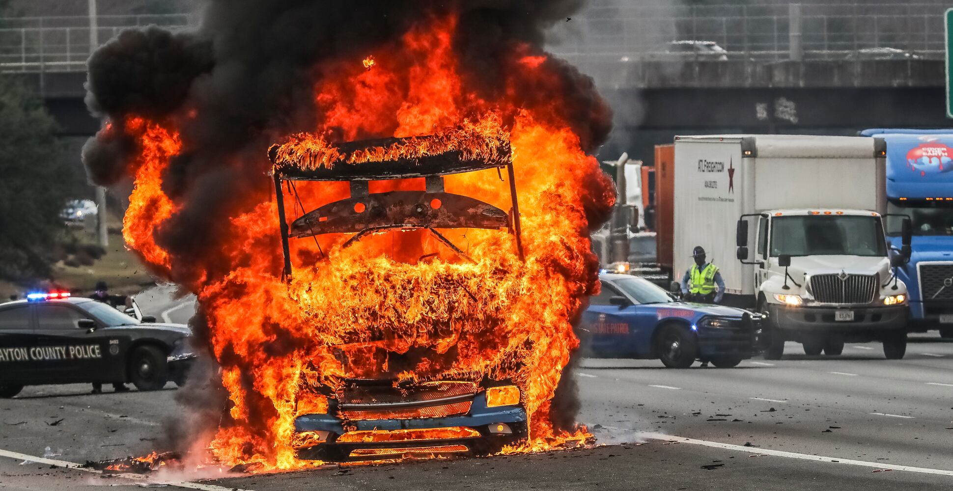 A Georgia Aquarium educational RV caught fire on I-285 in Clayton County on Wednesday morning, Jan. 11, 2023 authorities said. The driver was able to pull over, and no one was inside at the time of the fire nor sustained any injuries. (John Spink / John.Spink@ajc.com)

