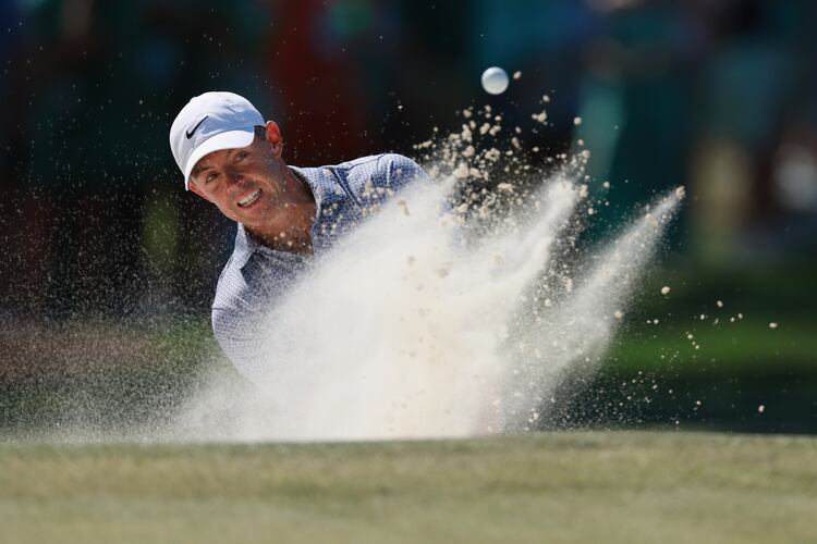 Rory McIlroy chips to the seventh green during the third round of the Masters at Augusta National on Saturday, April 11, 2026, in Augusta, Ga. (Jason Getz/AJC)