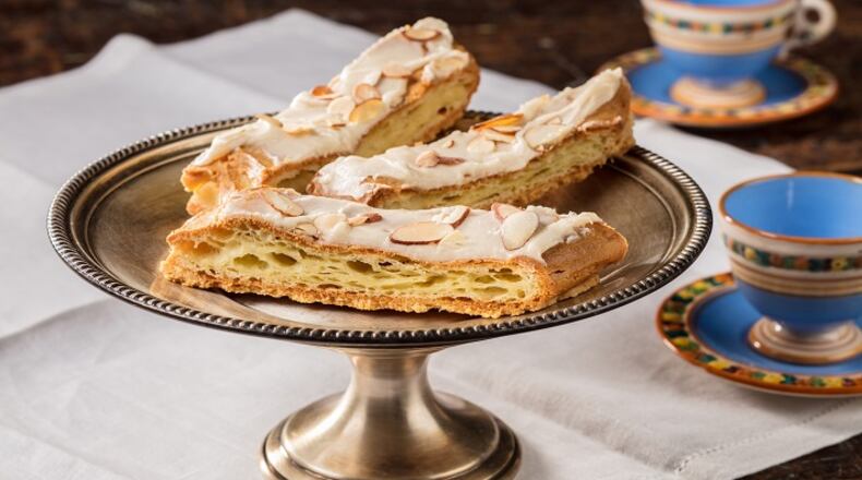 A layer of almond-paste-accented dough is sandwiched between two layers of another dough to make this flaky, rich kringle. (Zbigniew Bzdak/Chicago Tribune/TNS)