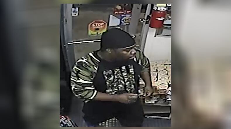 Fulton County police released photos of a man they believe killed a woman earlier this month. (Credit: Fulton County Police Department)