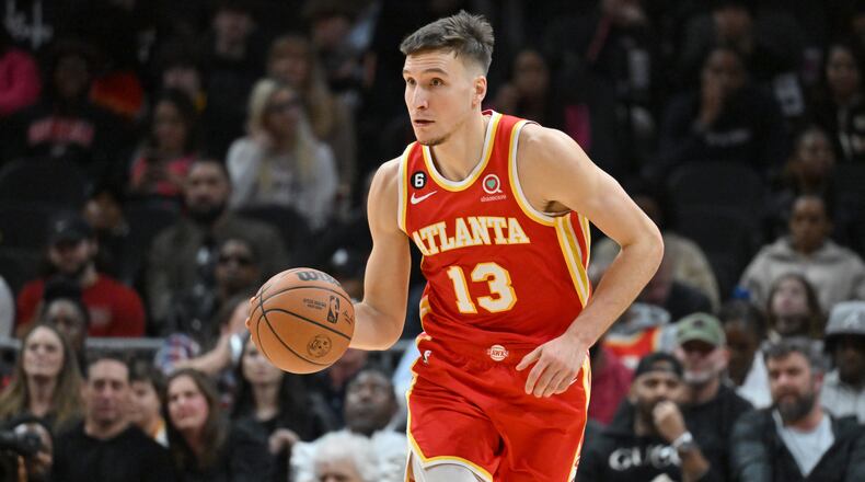 The Atlanta Hawks and Bogdan Bogdanovic agreed to a new deal, according to people familiar with the situation. The Hawks sharpshooter signed a four-year, $68 million contract extension. (Hyosub Shin file photo / Hyosub.Shin@ajc.com)