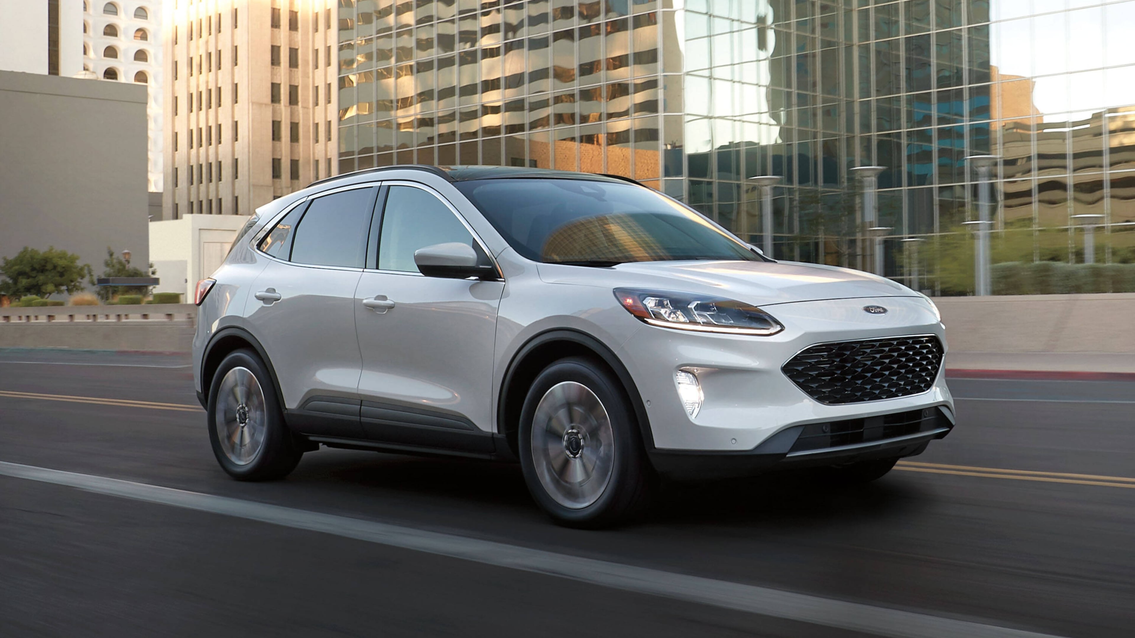 This photo provided by Ford shows the Escape, a compact SUV available as a hybrid on the used market for less than $25,000. (Courtesy of Ford Motor Co. via AP)
