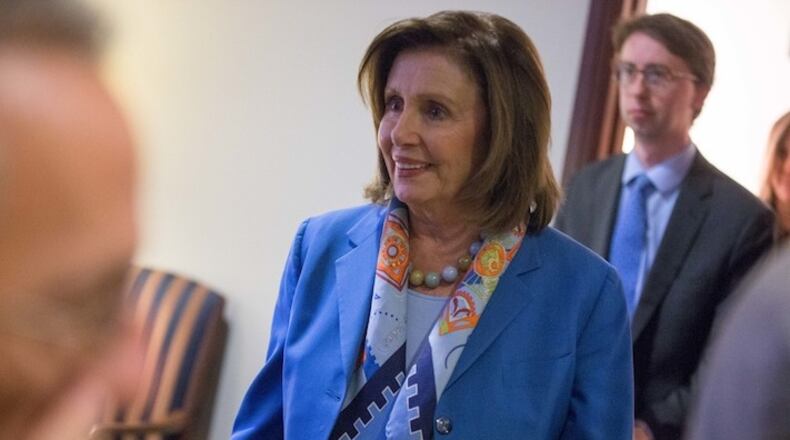 House Minority Leader Nancy Pelosi of Calif. departs after speaking at her weekly news conference on Capitol Hill in Washington, Thursday, May 19, 2016. Pelosi discussed Zika virus funding, expressed her sadness on the disappearance of EgyptAir flight MS804, and discussed other topics. (AP Photo/Andrew Harnik)