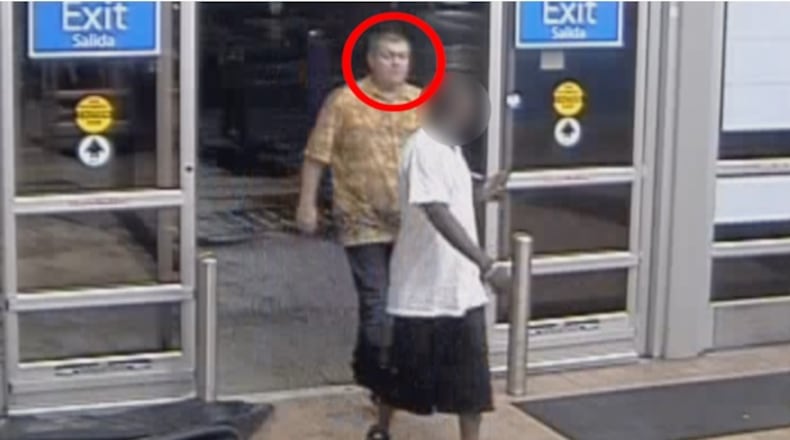 Gwinnett County fire investigators are looking for the man circled in red. They believe he goes by "Bob" and that he was responsible for a hotel fire
