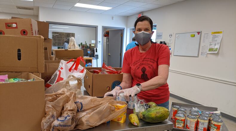Community Assistance Center works to prevent homelessness, alleviate hunger and promote self-sufficiency. One of its services includes a food pantry, which is supported by community volunteers. Courtesy of Community Assistance Center