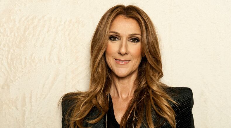 FILE - Singer Celine Dion poses for a portrait on Saturday, Dec. 14, 2013 in Los Angeles. (Photo by Jordan Strauss/Invision/AP, File)