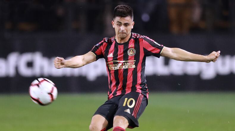Atlanta United midfielder Pity Martinez works against Herediano in their CONCACAF Champions League soccer match on Thursday, Feb. 28, 2019, in Kennesaw.