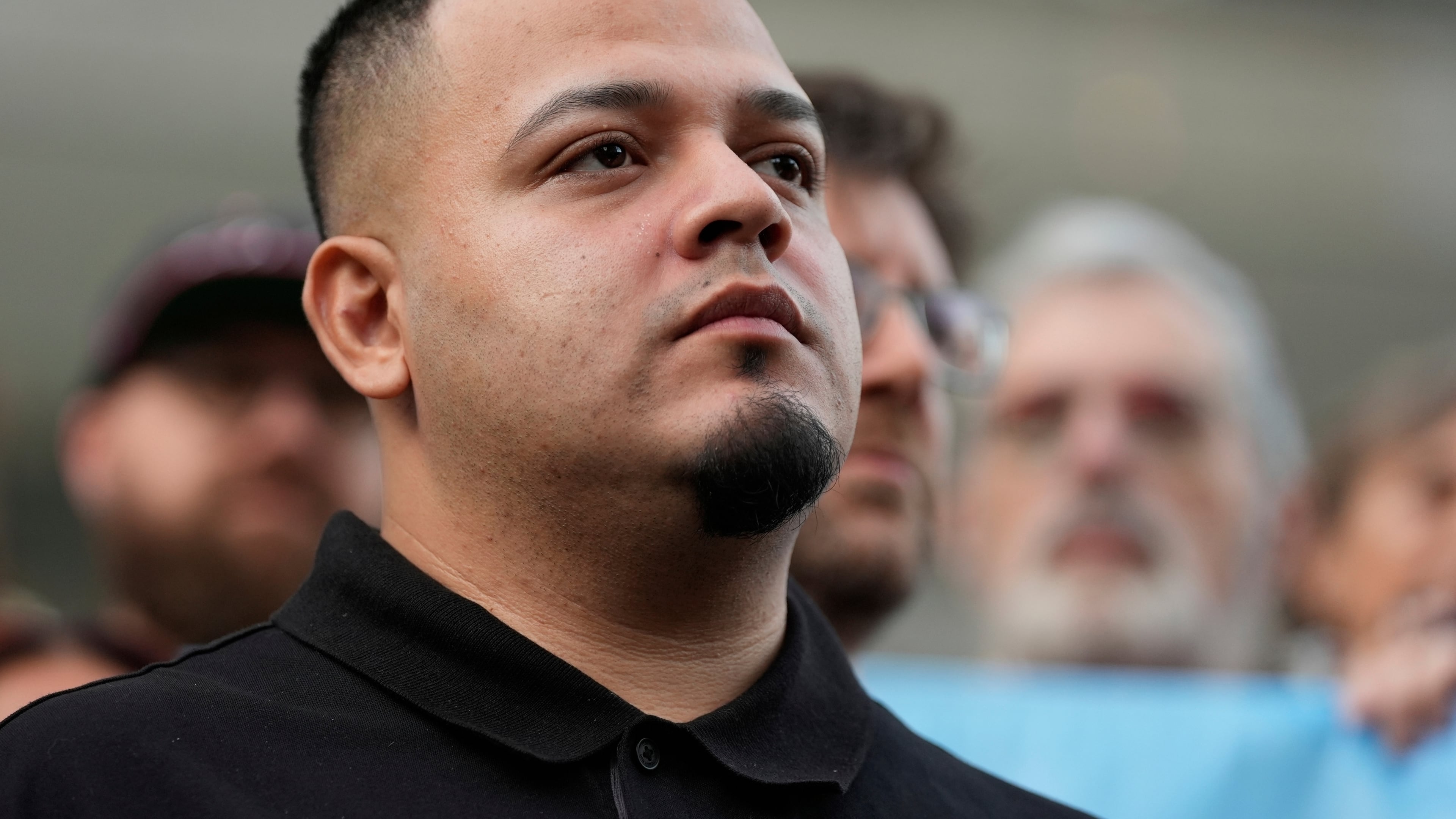 FILE - Kilmar Abrego Garcia attends a protest rally at the Immigration and Customs Enforcement field office in Baltimore, Aug. 25, 2025, to support Abrego Garcia. (AP Photo/Stephanie Scarbrough, File)