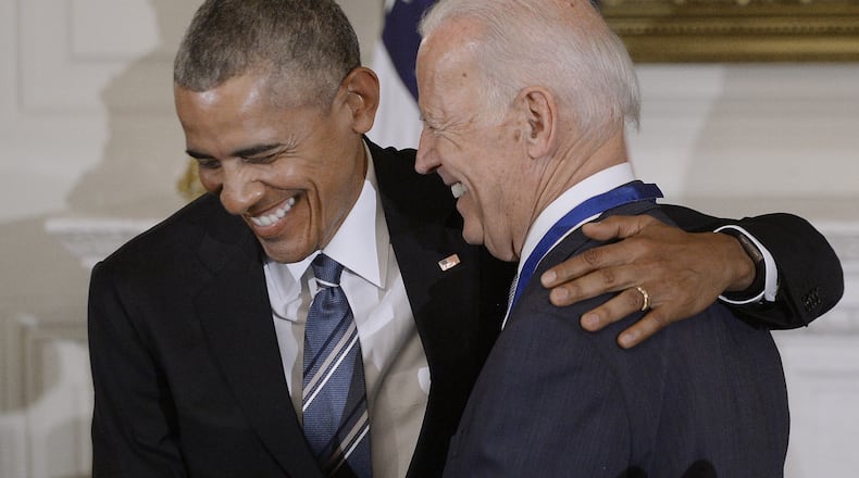 WASHINGTON, DC - JANUARY 12: President Barack Obama (R) presents the Medal of Freedom to Vice-President Joe Biden during an event in the State Dinning room of the White House, January 12, 2017 in Washington, DC. (Photo by Olivier Douliery-Pool/Getty Images)