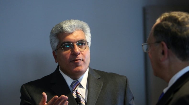 Rajeev Dhawan, director of the Georgia State Economic Forecasting Center, shrugged off several months of job losses, saying that he expects job growth to be solid this year.