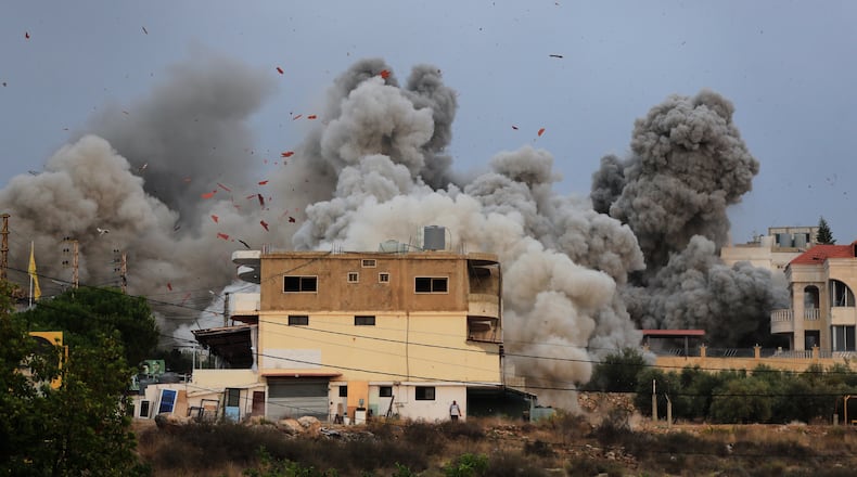 Smoke rises following an Israeli airstrike in the village of Teir Debba, southern Lebanon, Thursday, Nov. 6, 2025. (AP Photo/Mohammad Zaatari)