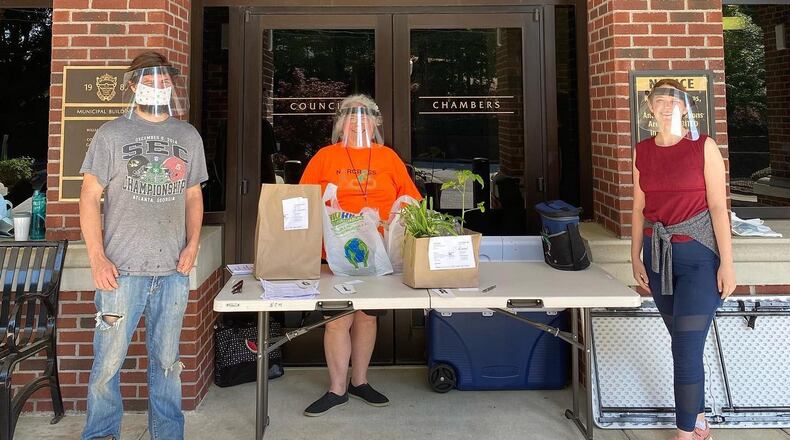 Volunteers are ready to hand off online orders placed with the Norcross Community Market. (Courtesy Norcross Community Market)