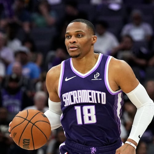 FILE - Sacramento Kings guard Russell Westbrook (18) dribbles the ball during the second half of an NBA basketball game against the Philadelphia 76ers, Thursday, March 19, 2026, in Sacramento, Calif. (AP Photo/Justine Willard,File)