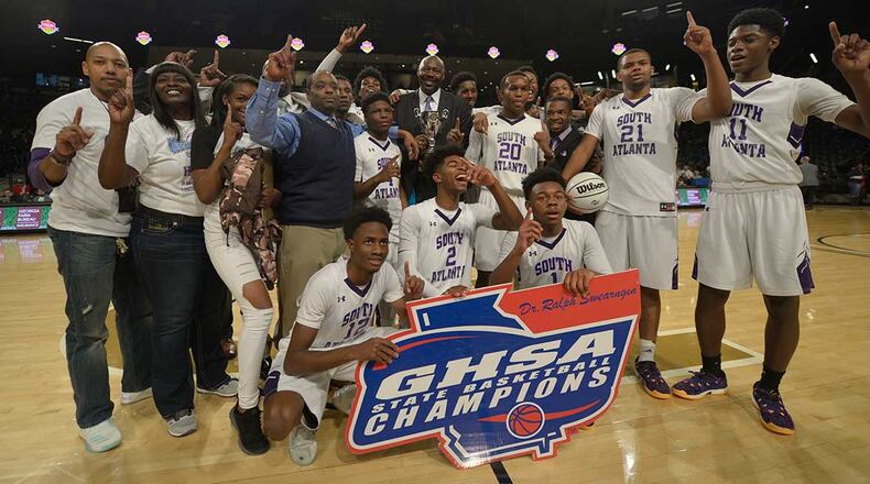 The South Atlanta Hornets celebrate their Class AA state championship win over Swainsboro at Georgia Tech Saturday.
