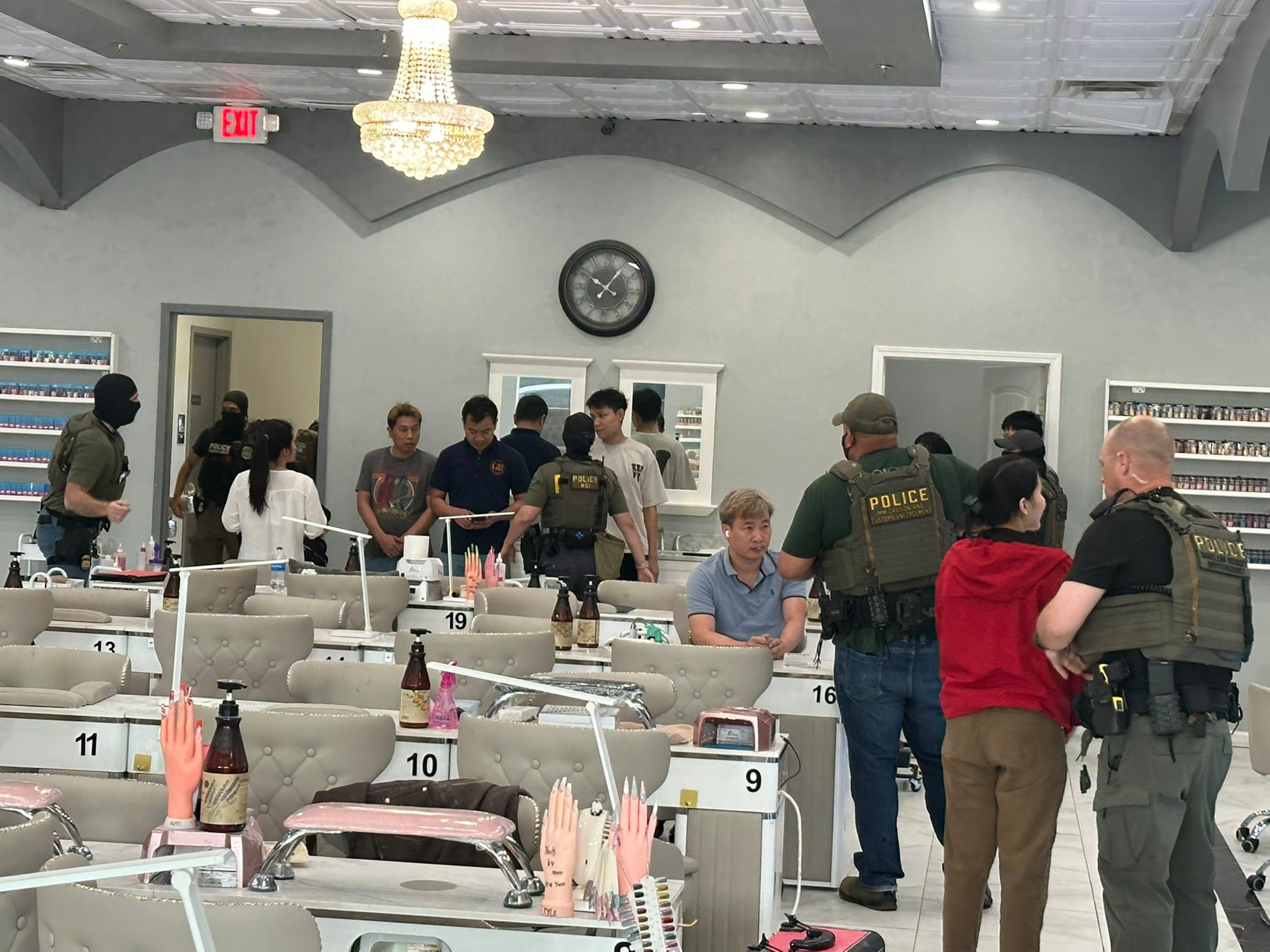 Immigration officials raided a nail salon in Marietta earlier this month and made 12 arrests.