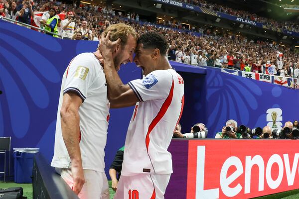 England forward Harry Kane (left) and midfielder Jude Bellingham celebrate Kane's first goal against Congo in a World Cup match at Atlanta Stadium on Wednesday, July 1, 2026. (Jason Getz/AJC)