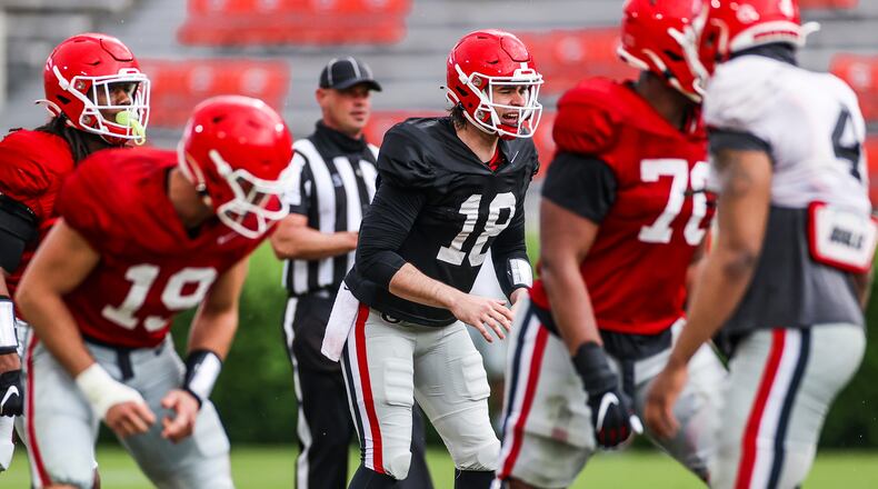 Georgia quarterback JT Daniels (18) calls a play during the Bulldogs’ scrimmage Saturday, April 10, 2021, on Dooley Field at Sanford Stadium in Athens. (Tony Walsh/UGA)