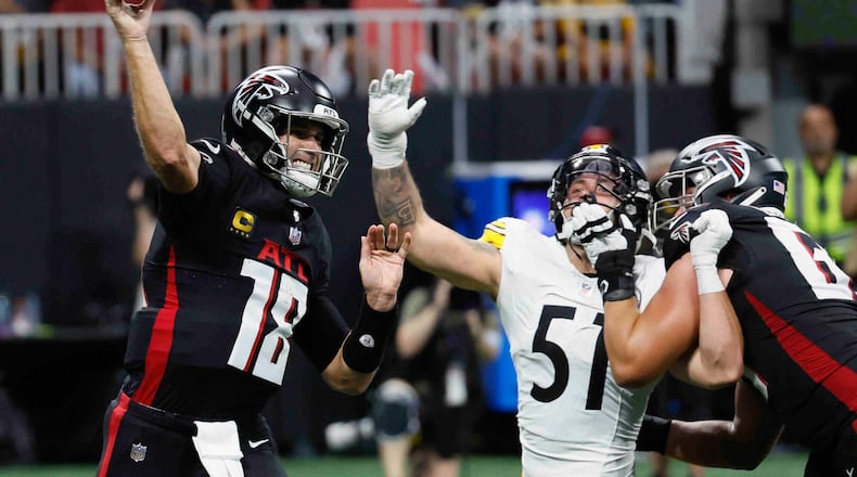 Atlanta Falcons quarterback Kirk Cousins (18) throws a pass during the second half of an NFL football game against the Pittsburgh Steelers on Sunday, Sept. 8, at Mercedes-Benz Stadium in Atlanta. 
(Miguel Martinez/ AJC)