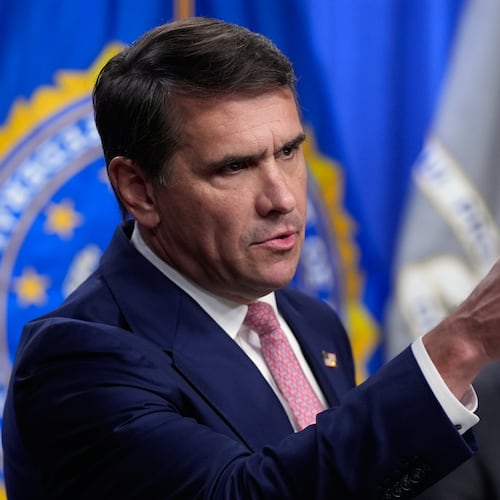 Acting Attorney General Todd Blanche speaks as FBI director Kash Patel speaks during a news conference at the Department of Justice, Wednesday, July 1, 2026 in Washington. (AP Photo/Manuel Balce Ceneta)