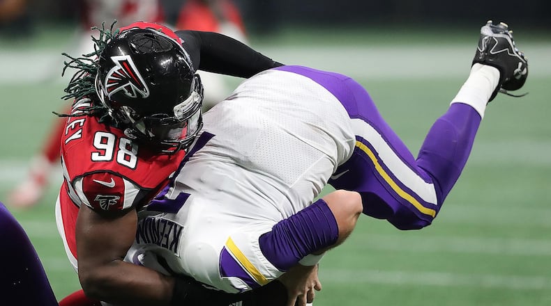 December 3, 2017 Atlanta: Falcons defensive end Takkarist McKinley sacks Vikings quarterback Case Keenum during the second quarter in a NFL football game on Sunday, December 3, 2017, in Atlanta. Curtis Compton/ccompton@ajc.com
