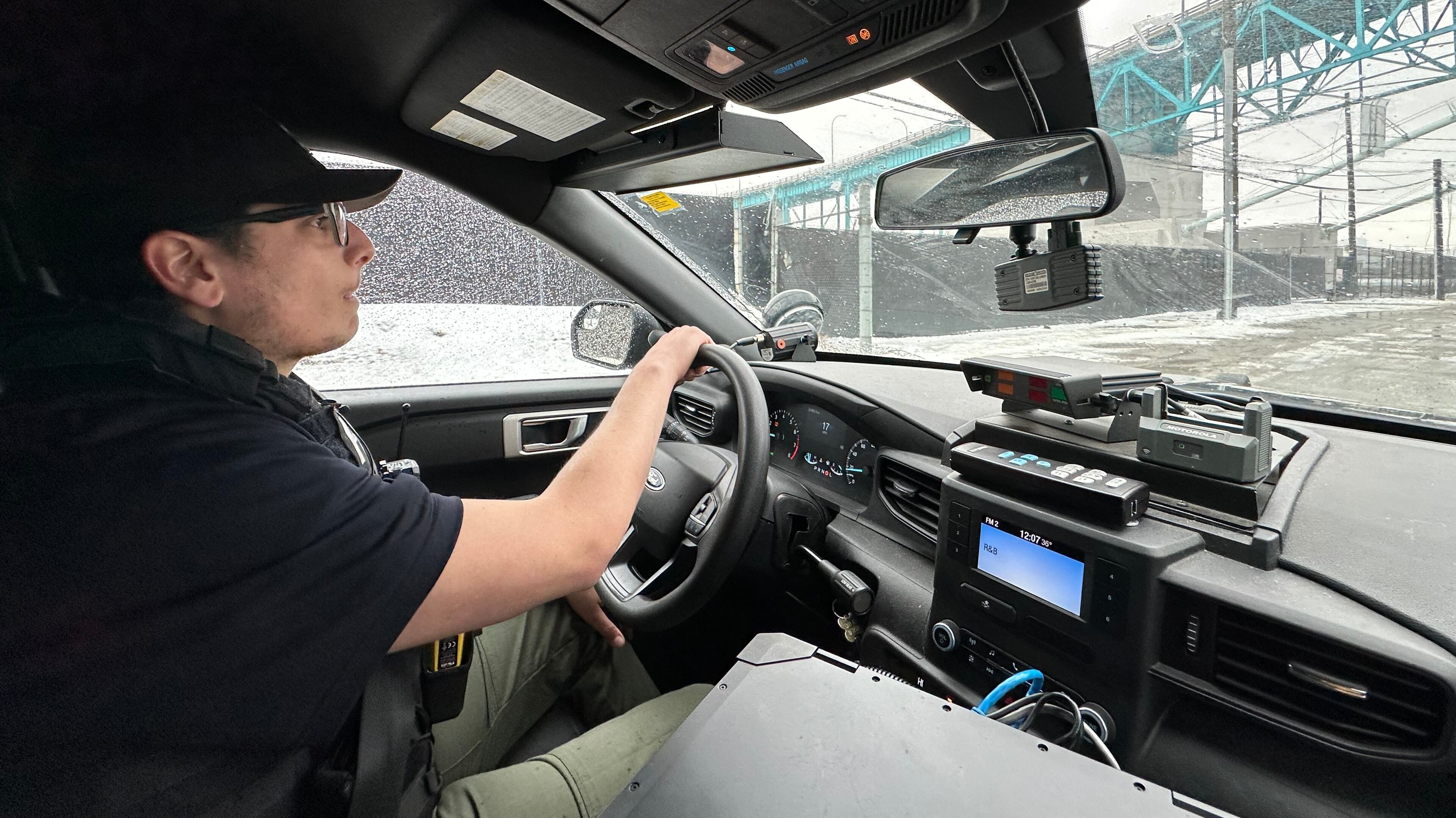 Detroit Police Commercial Theft Section Officer Ibrahim Kakish participates in a demonstration of how Ford is using technology to fight thefts of its F-150 pickups and F-250 Super Duty pickups on Wednesday, Dec. 10, 2025. (AP Photo/Corey Williams)