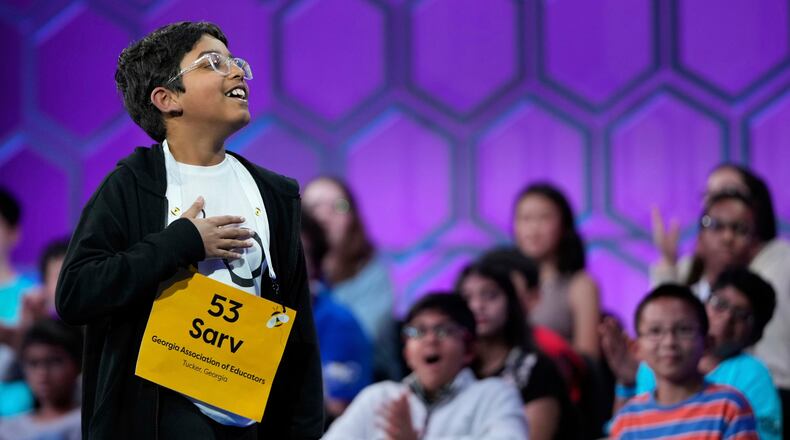 FILE - Sarv Dharavane, 11, of Tucker, Ga., reacts after spelling his word correctly in the finals of the Scripps National Spelling Bee, Thursday, May 29, 2025, in Oxon Hill, Md. (AP Photo/Julia Demaree Nikhinson, File)