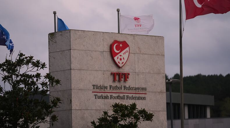A Turkish flag waves at the Turkish Football Federation headquarters, in Istanbul, Turkey, Wednesday, Nov. 12, 2025. (AP Photo/Francisco Seco)