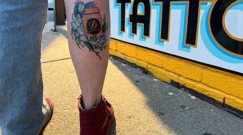 Taylor Bell of Richmond, Virginia, poses with her new Duke's Mayo-inspired tattoo at Yellow Bird Tattoo. / Courtesy of Duke's Mayonnaise