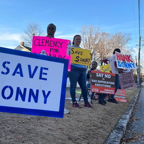 People gather outside the Alabama Governor's Mansion in Montgomery, Ala., on Feb. 16, 2026, to urge Gov. Kay Ivey to grant clemency to Sonny Burton, who is scheduled to be executed on March 12, 2026. (AP Photo/Kim Chandler)
