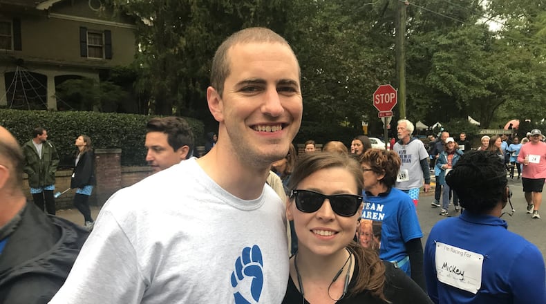 Tawny Mack with her husband, Zack Howard, before the start of Saturday’s Undy Run held annually to raise awareness about colorectal cancer. CONTRIBUTED