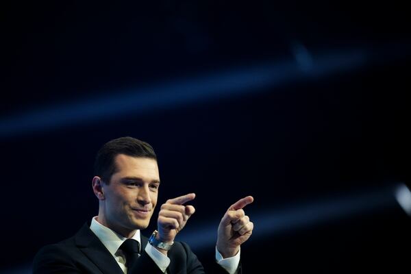 FILE - French Far-right party National Rally president Jordan Bardella delivers a speech at a meeting in Marseille, southern France, Sunday, March 3, 2024. (AP Photo/Daniel Cole, File)