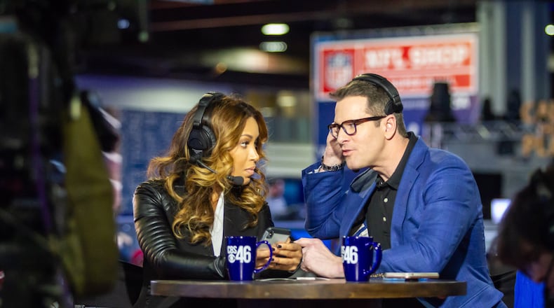 CBS anchors Sharon Reed and Thomas Roberts broadcast live during the Super Bowl Experience Driven By Hyundai at the World Congress Center on January 29, 2019. STEVE SCHAEFER / SPECIAL TO THE AJC