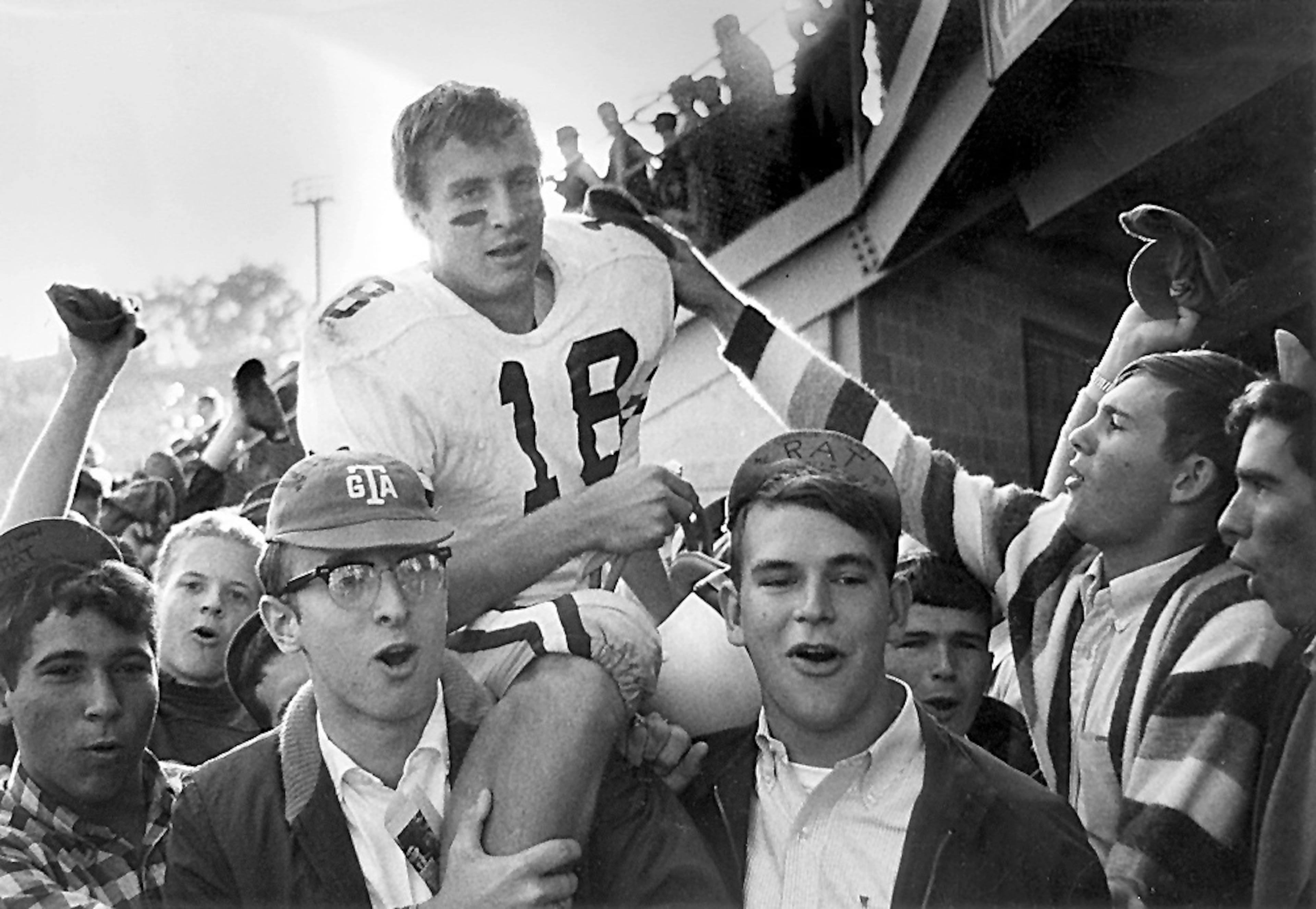 Georgia Tech quarterback Kim King cheered on by Tech students after game. King played at Tech from 1965-67. (Photo courtesy of Georgia Tech)