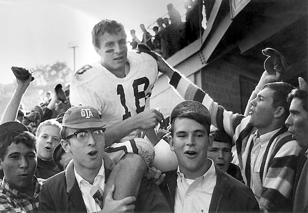 Georgia Tech quarterback Kim King cheered on by Tech students after game. King played at Tech from 1965-67.  (Photo courtesy of Georgia Tech)