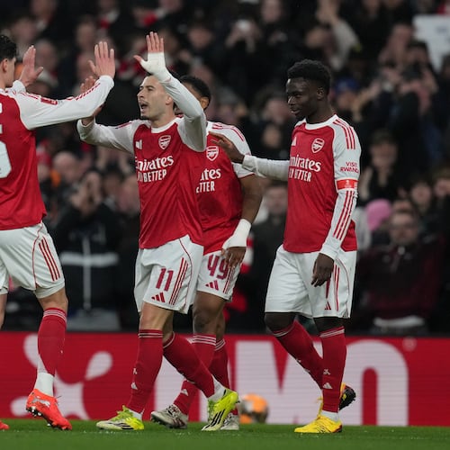 Arsenal's Gabriel Martinelli, center, celebrates with teammates after scoring their side's second goal during the English FA Cup soccer match between Arsenal and Wigan Athletic in London, Sunday, Feb. 15, 2026.(AP Photo/Maja Smiejkowska)