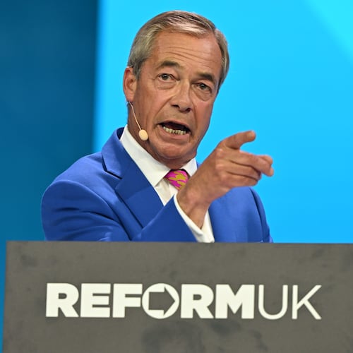 Reform Party Leader Nigel Farage points as he speaks during the Reform party's annual conference at the National Exhibition Centre in Birmingham, England, Friday, Sept. 4, 2026. (AP Photo/Thomas Krych)
