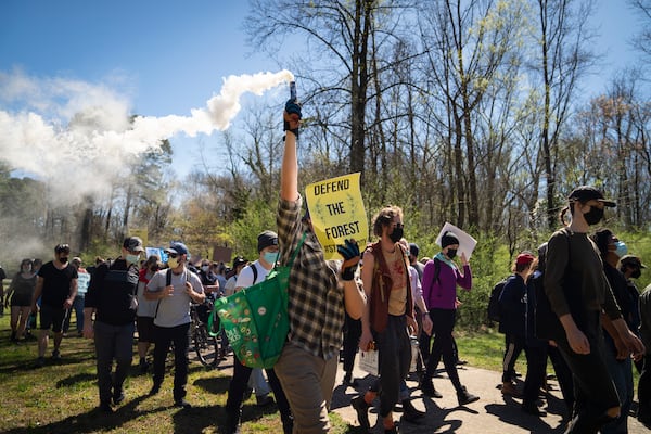 People protest Atlanta’s plan to build a police and fire training center known to critics as “Cop City,” in Gresham Park near Atlanta, March 4, 2023. Atlanta is ready to build the complex, but opponents say that it will further militarize officers and destroy precious green space. (Nicole Craine/The New York Times)