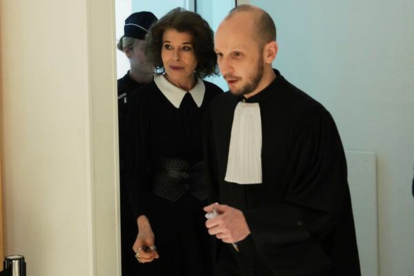 Actor Fanny Ardant, left, arrives to testify as actor Gerard Depardieu goes on trial for the alleged sexual assaults of two women on a film set in 2021, Wednesday, March 26, 2025 in Paris. (AP Photo/Aurelien Morissard)