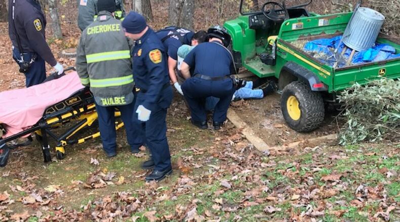 Cherokee County fire crews free a 90-year-old man from under an off-road vehicle.