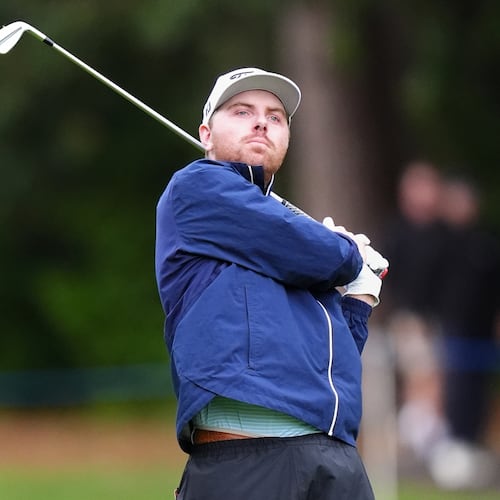 Ryan Gerard, of United States, watches his shot during the first round of the PGA Championship golf tournament in Virginia Water, England, Thursday, Sept. 17, 2026. (Adam Davy/PA via AP)