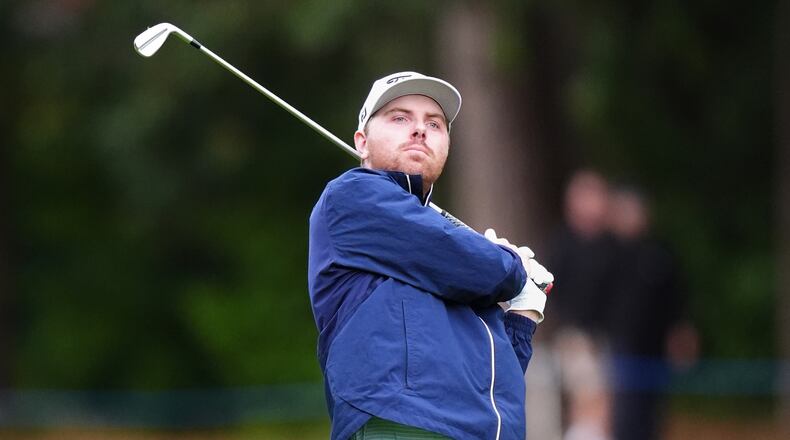 Ryan Gerard, of United States, watches his shot during the first round of the PGA Championship golf tournament in Virginia Water, England, Thursday, Sept. 17, 2026. (Adam Davy/PA via AP)