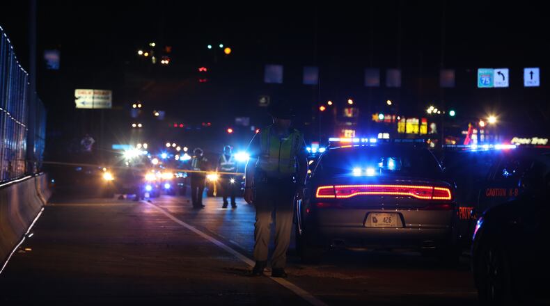 An investigation was underway after a Georgia State Patrol trooper was struck by a vehicle Wednesday night in Cobb County. (Ben Gray / bgray@ajc.com)
