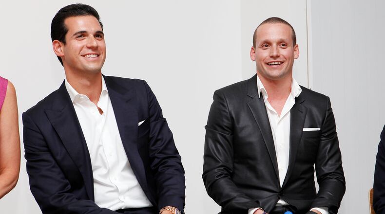 FILE - Oren Alexander and Tal Alexander speak at a panel at the Rockstars of Real Estate Event, Sept. 3, 2013 in New York. (Photo by Amy Sussman/Invision for DETAILS Magazine/AP Images, File)