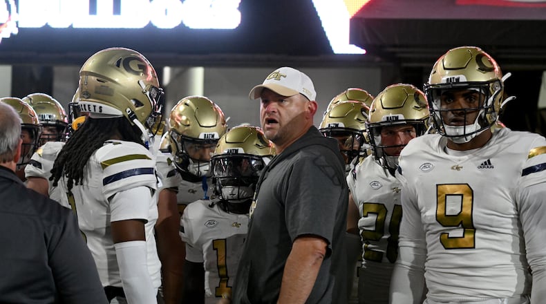 Georgia Tech head coach Brent Key fires up before an NCAA football game against Georgia Tech at Sanford Stadium, Friday, November 29, 2024, in Athens. Georgia won 44-42 in eight overtimes. (Hyosub Shin / AJC)