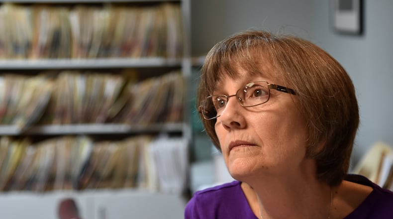 Janet Cosper is hopeful that proposed changes will allow her to collect her husband’s pension. Hal Cosper worked more than 20 years for the City of Marietta as a building inspector. BRANT SANDERLIN/BSANDERLIN@AJC.COM