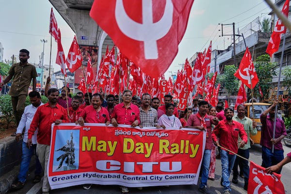 Members of Centre of India Trade Unions (CITU) participate in a rally to mark May Day in Hyderabad, India, Thursday, May 1, 2025. (AP Photo/Mahesh Kumar A.)