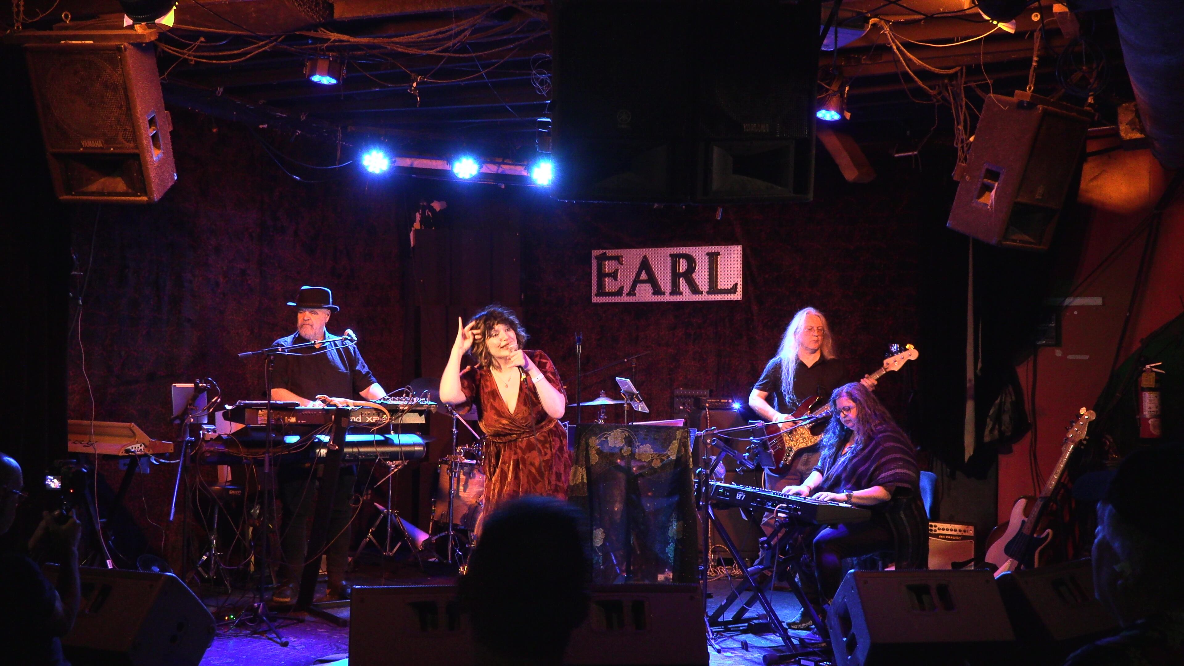 Allen Welty-Green, Audrey Gamez, Bill Sommer (behind Gamez), Rob Dwyer and Marva Rodriguez channel British art-rock star Kate Bush in their tribute band Hounds of Love. (Courtesy of Jay Hudson)