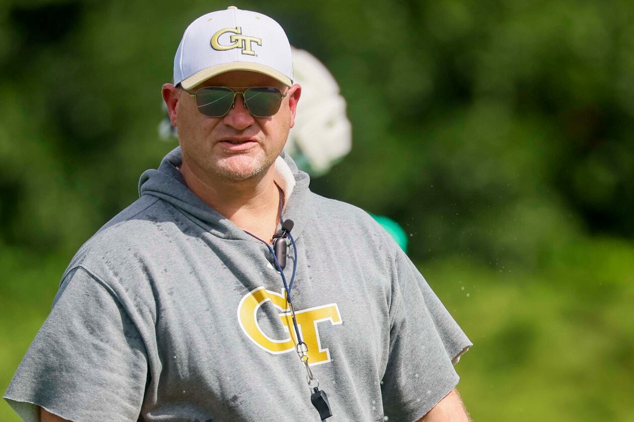 Georgia Tech coach Brent Key observes the offense practicing during the first day of training at Rose Bowl Field and the Brock Football Practice Facility on Monday, Aug. 3, 2026, in Atlanta. (Miguel Martinez/AJC)